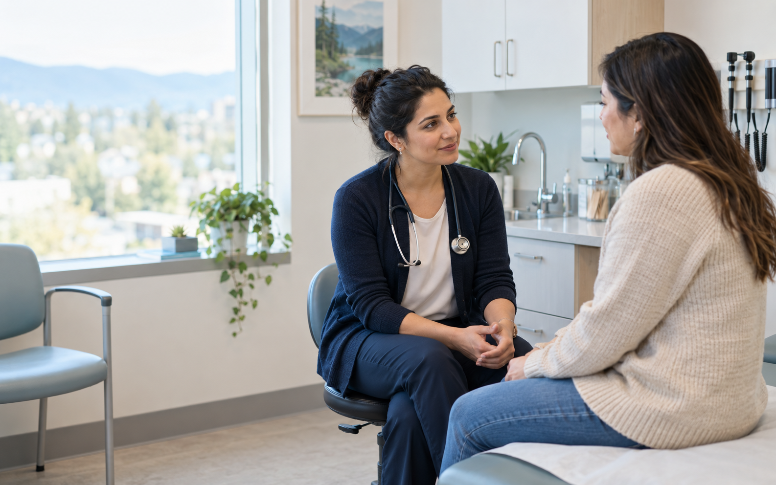 A physician speaking warmly with a patient in a bright clinic room